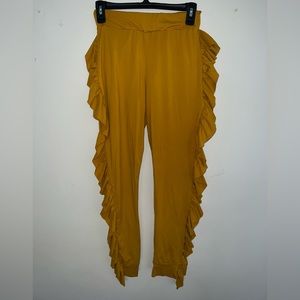 Side ruffle. Size is M. Orange color